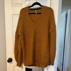 Rust orange free people v-neck sweater - size Medium! Gently used. Oversized